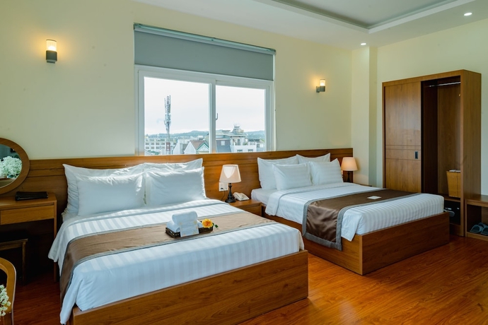 Imagen de la habitación del Hotel BomBo Dalat. Foto 12