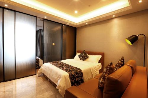Imagen de la habitación del Hotel Boman Holiday Apartment Jie Deng Du Hui Branch. Foto 6