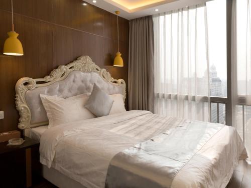 Imagen de la habitación del Hotel Boman Holiday Apartment Jie Deng Du Hui Branch. Foto 9