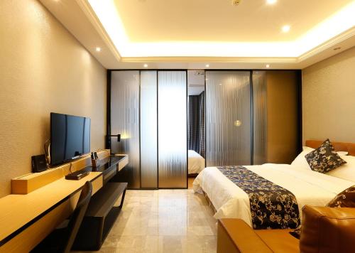 Imagen general del Hotel Boman Holiday Apartment Jie Deng Du Hui Branch. Foto 5