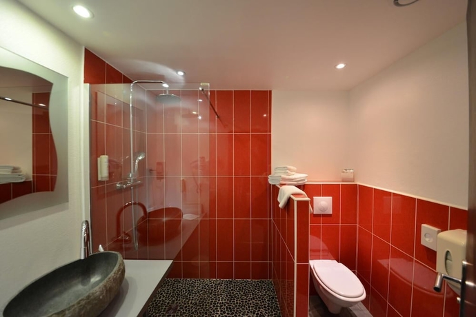 Imagen de la habitación del Hotel Bomotel. Foto 19