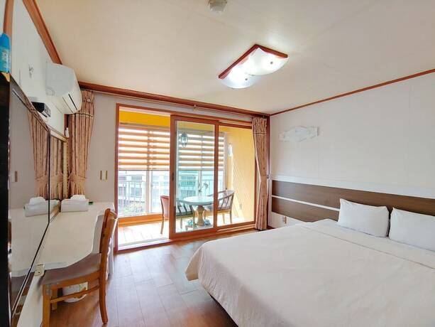 Imagen de la habitación del Hotel Bomulsum. Foto 17