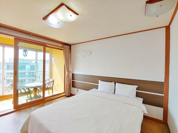 Imagen de la habitación del Hotel Bomulsum. Foto 19