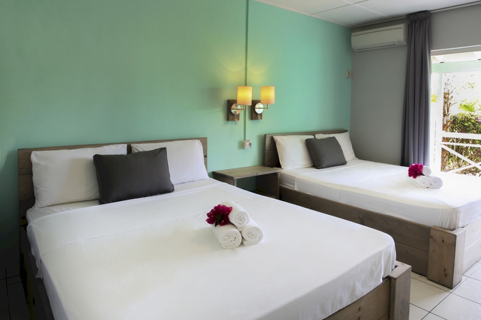 Imagen de la habitación del Hotel Bon Bini Seaside Resort. Foto 7