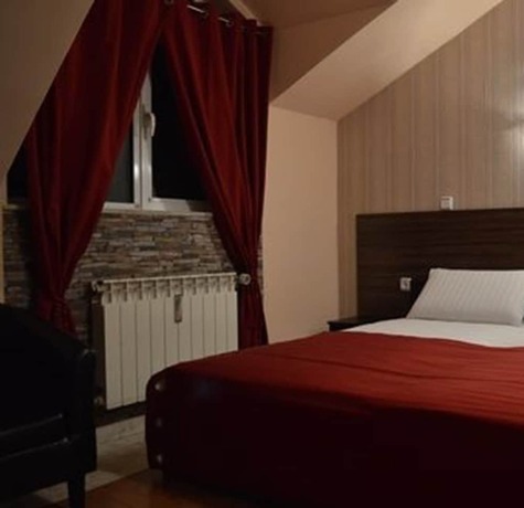 Imagen de la habitación del Hotel Bon Bon. Foto 16