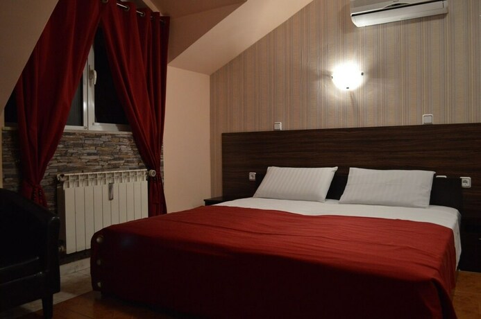 Imagen de la habitación del Hotel Bon Bon. Foto 17