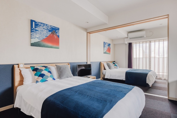 Imagen de la habitación del Hotel Bon Condo Namba Nipponbashi. Foto 4