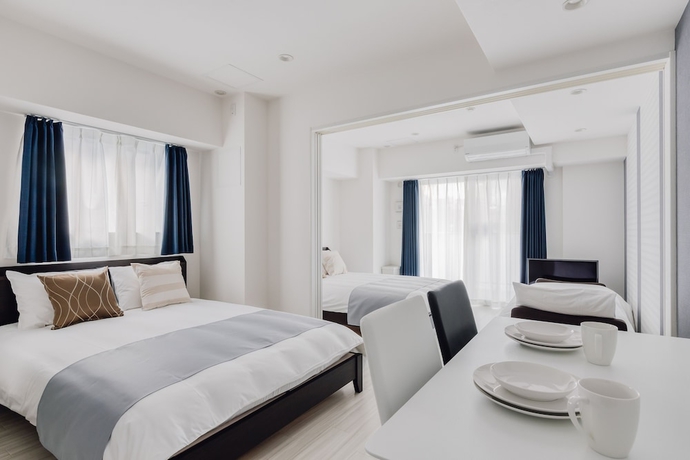 Imagen de la habitación del Hotel Bon Condo Namba Nipponbashi. Foto 5