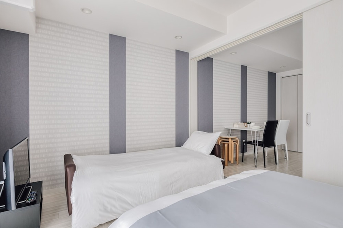 Imagen de la habitación del Hotel Bon Condo Namba Nipponbashi. Foto 6