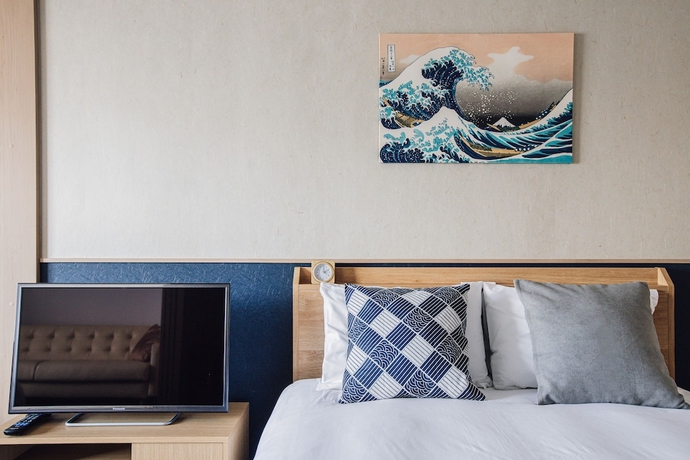 Imagen de la habitación del Hotel Bon Condo Namba Nipponbashi. Foto 15