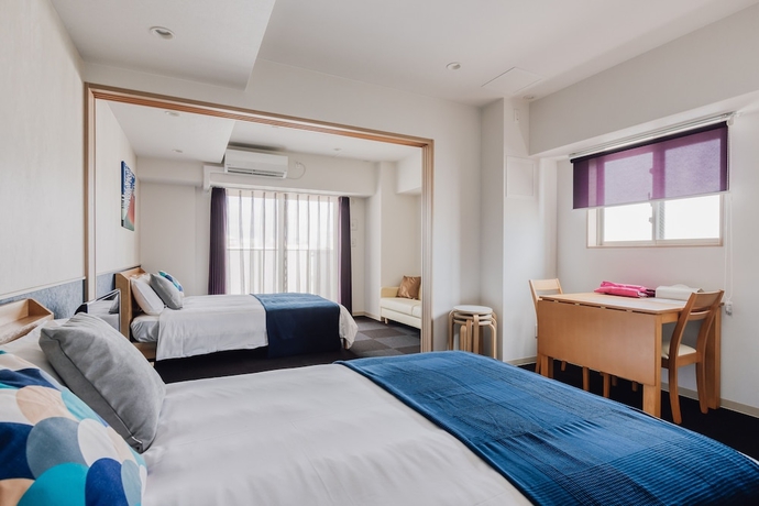 Imagen de la habitación del Hotel Bon Condo Namba Nipponbashi. Foto 18