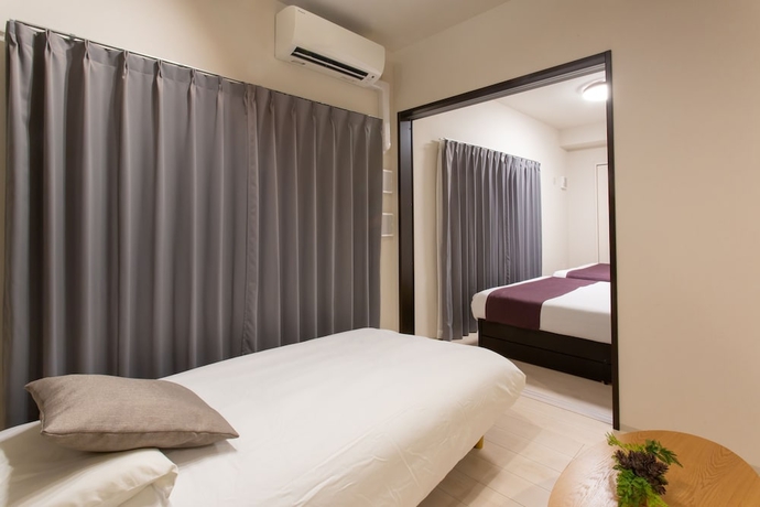 Imagen de la habitación del Hotel Bon Condominium Umeda. Foto 5