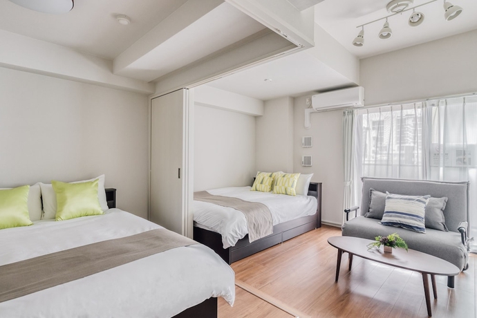 Imagen de la habitación del Hotel Bon Condominium Umeda. Foto 6