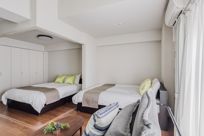 Imagen de la habitación del Hotel Bon Condominium Umeda. Foto 7