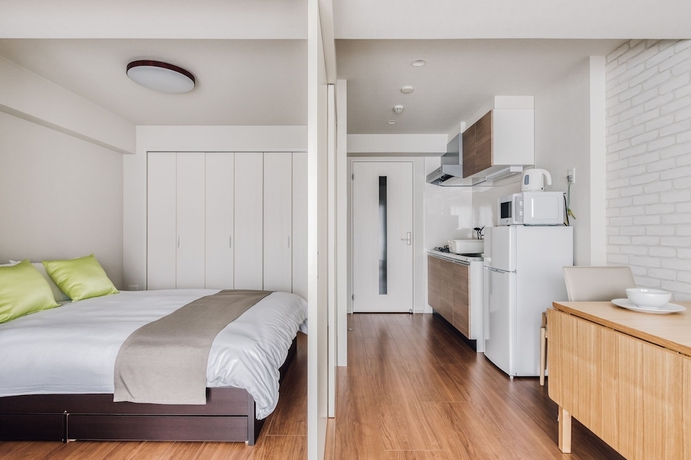 Imagen de la habitación del Hotel Bon Condominium Umeda. Foto 8