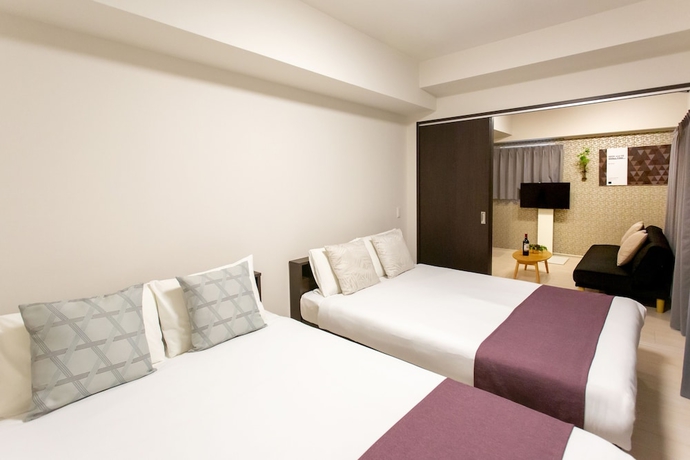 Imagen de la habitación del Hotel Bon Condominium Umeda. Foto 12