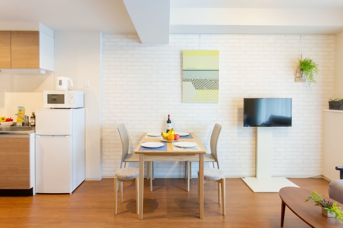 Imagen de la habitación del Hotel Bon Condominium Umeda. Foto 14