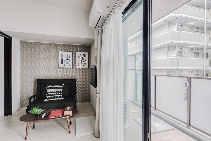 Imagen de la habitación del Hotel Bon Condominium Umeda. Foto 15