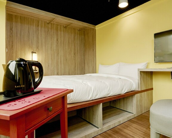 Imagen de la habitación del Hotel Bon Hotel Taipei. Foto 13
