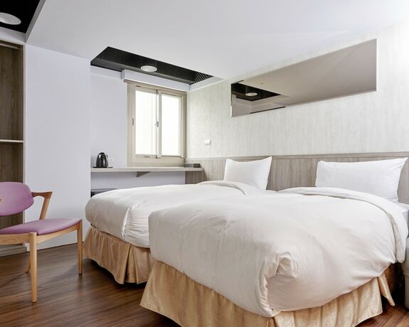 Imagen de la habitación del Hotel Bon Hotel Taipei. Foto 14