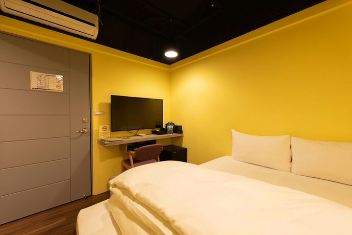 Imagen de la habitación del Hotel Bon Hotel Taipei. Foto 18