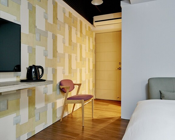 Imagen de la habitación del Hotel Bon Hotel Taipei. Foto 22