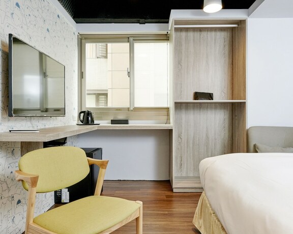 Imagen de la habitación del Hotel Bon Hotel Taipei. Foto 23
