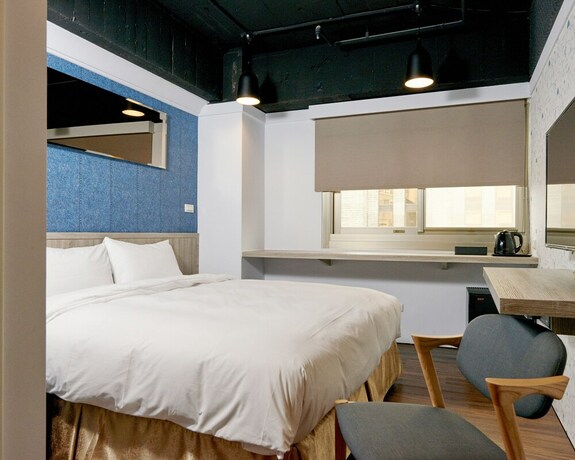 Imagen de la habitación del Hotel Bon Hotel Taipei. Foto 27