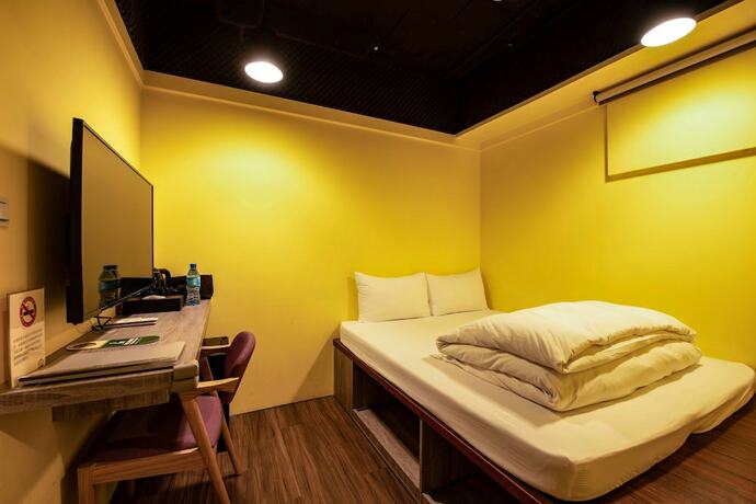 Imagen de la habitación del Hotel Bon Hotel Taipei. Foto 30