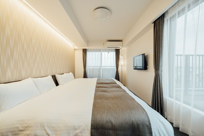 Imagen de la habitación del Hotel Bon Kyoto Station. Foto 19