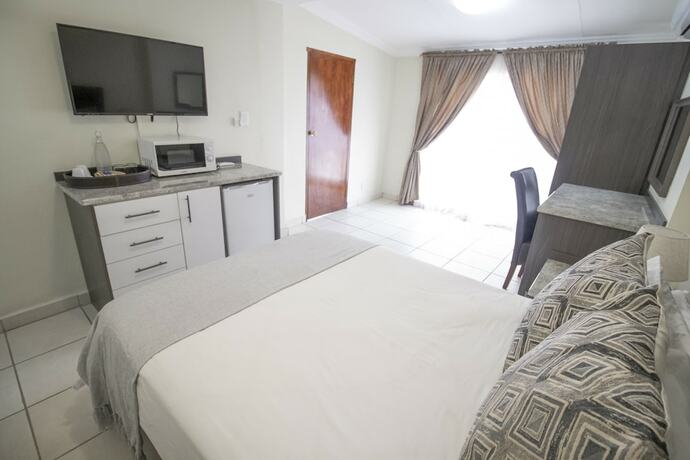 Imagen de la habitación del Hotel Bon Rustenburg. Foto 13