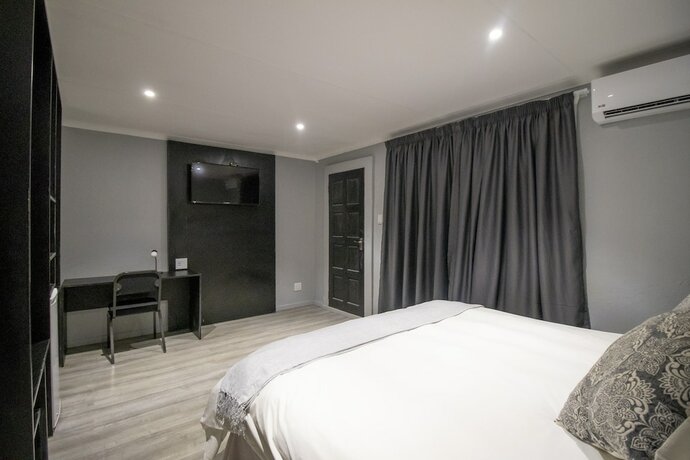 Imagen de la habitación del Hotel Bon Rustenburg. Foto 18