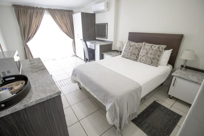 Imagen de la habitación del Hotel Bon Rustenburg. Foto 20