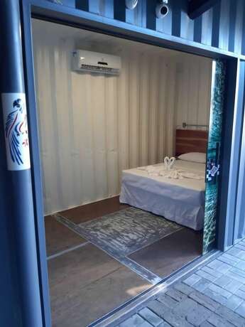Imagen de la habitación del Hotel Bonito MotoBox. Foto 19