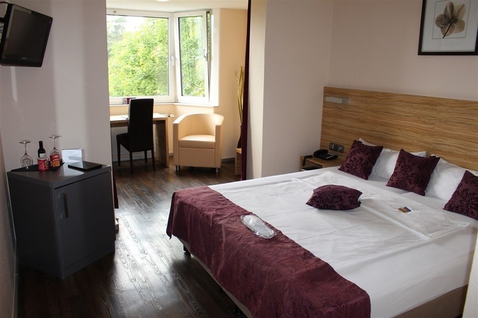 Imagen de la habitación del Hotel Bonjour. Foto 6