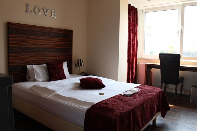 Imagen de la habitación del Hotel Bonjour. Foto 8