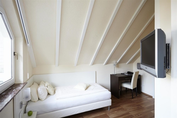 Imagen de la habitación del Hotel Bonjour. Foto 9