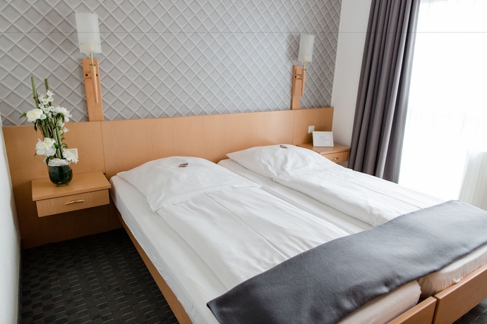 Imagen de la habitación del Hotel Bonn City. Foto 9