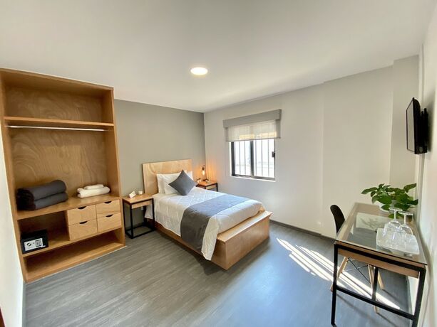 Imagen de la habitación del Hotel Bonsai Second Home. Foto 13