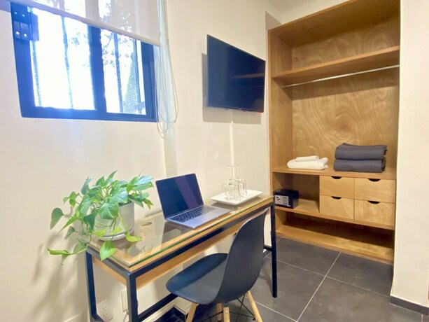 Imagen de la habitación del Hotel Bonsai Second Home. Foto 20