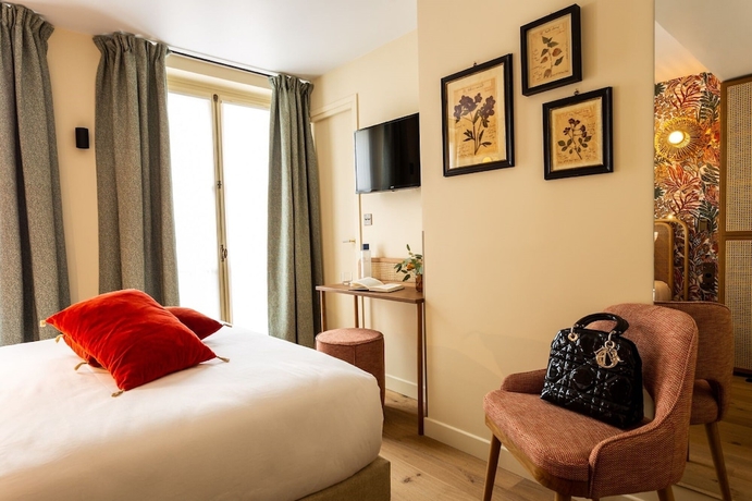 Imagen de la habitación del Hotel Bonsoir Madame. Foto 8