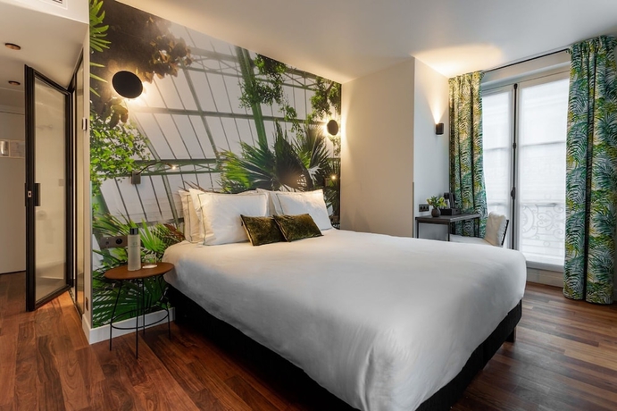 Imagen de la habitación del Hotel Bonsoir Madame. Foto 9