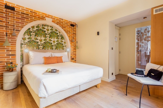 Imagen de la habitación del Hotel Bonsoir Madame. Foto 12