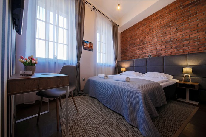 Imagen de la habitación del Hotel Boogie Aparthouse Old Town. Foto 7