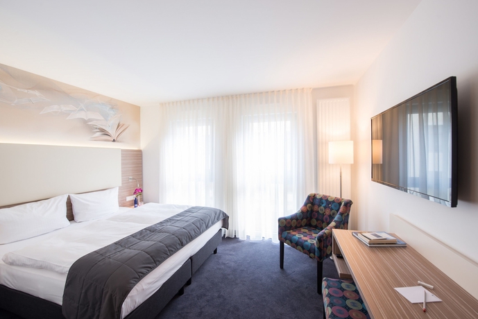 Imagen de la habitación del Hotel Book Leipzig. Foto 2