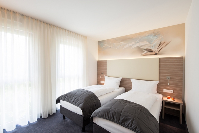 Imagen de la habitación del Hotel Book Leipzig. Foto 8