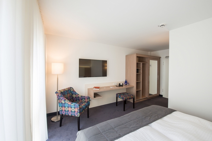 Imagen de la habitación del Hotel Book Leipzig. Foto 9