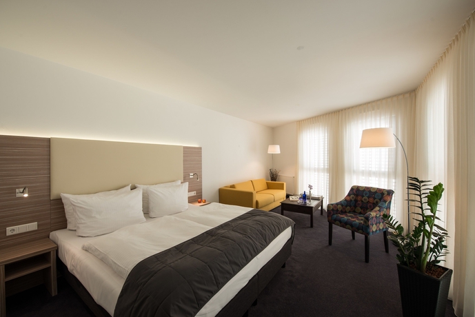 Imagen de la habitación del Hotel Book Leipzig. Foto 12