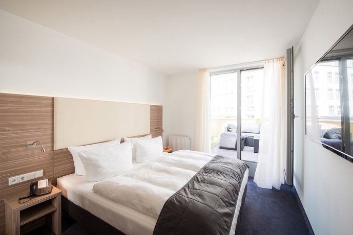 Imagen de la habitación del Hotel Book Leipzig. Foto 14