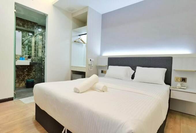Imagen de la habitación del Hotel BookMe. Foto 11